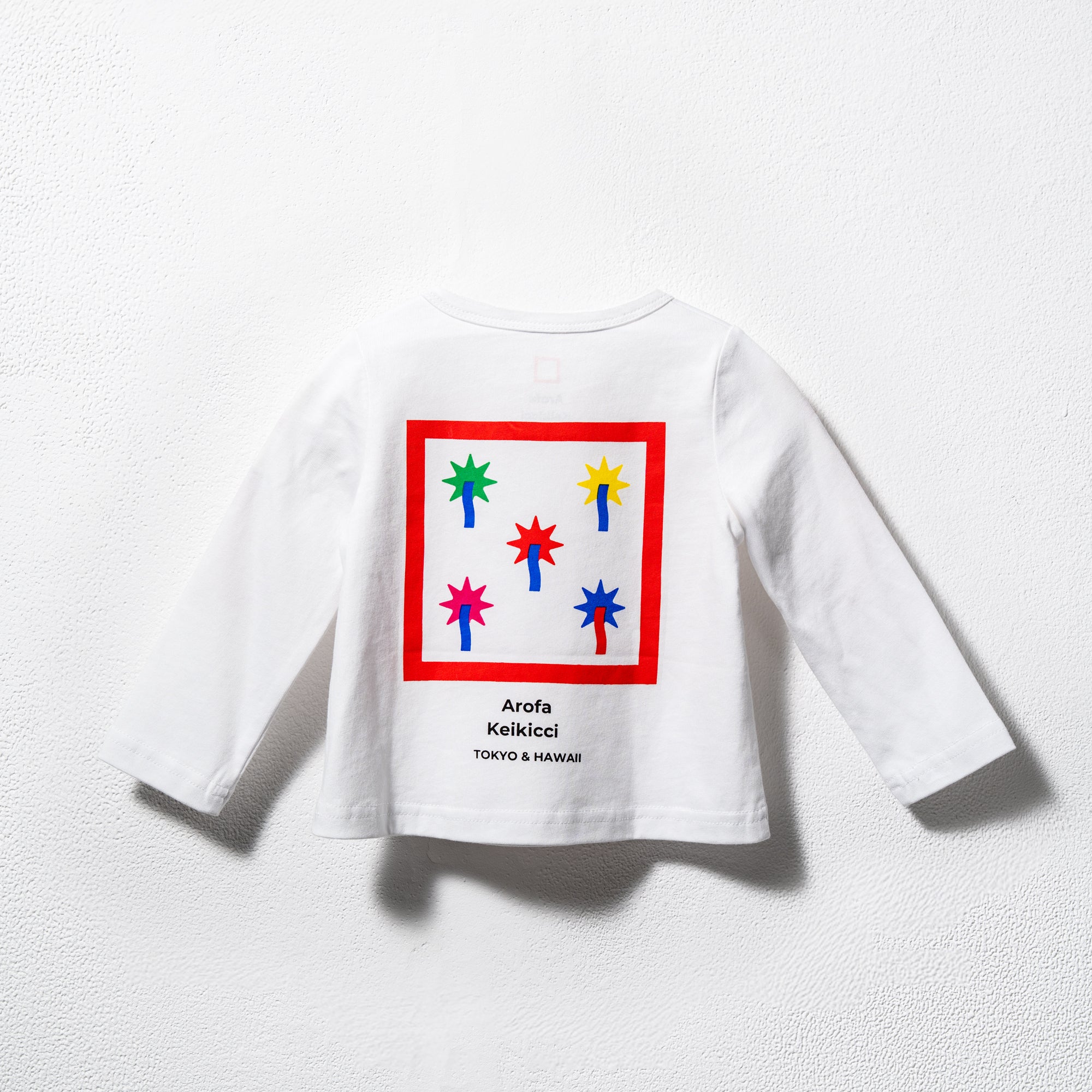 The Fun Begins（白い長袖Tシャツ）